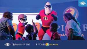 Children interact with characters from "The Incredibles" at a Disney Cruise Line event, celebrating Pixar Day at Sea.