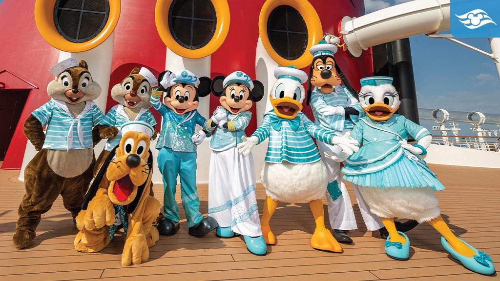 disney-cruise-ine-25th-anniversary-kickoff A group of iconic Disney characters in nautical-themed outfits poses together on a cruise ship deck with a bright red backdrop.