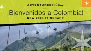 A vibrant promotional image for Disney Adventures featuring a mountainous landscape in Colombia with palm trees and a welcoming message for 2024.
