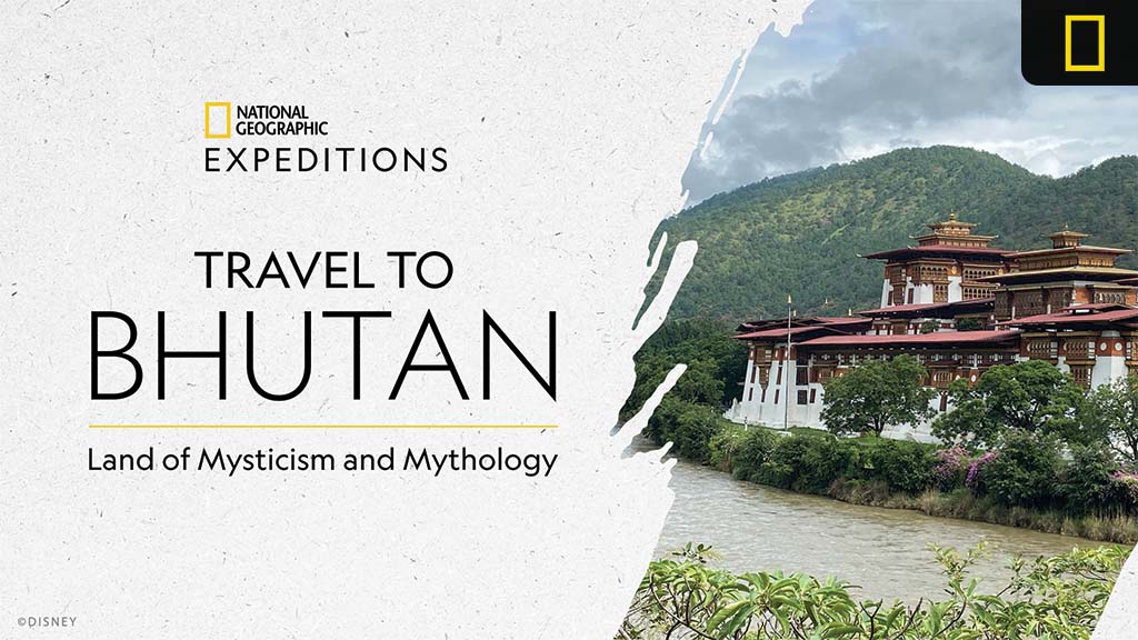bhutan-nat-geo-expeditions A serene landscape of Bhutan featuring traditional architecture beside a river, highlighted by the text "Travel to Bhutan: Land of Mysticism and Mythology."