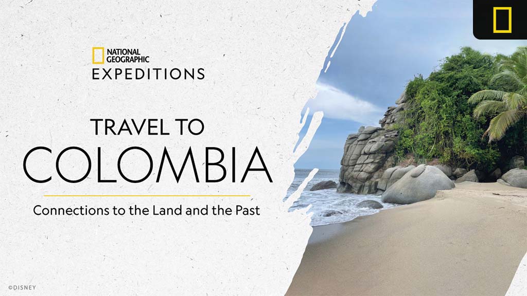 nat-geo-expeditions-colombia A scenic beach in Colombia with rocky cliffs and lush greenery, featuring the text "Travel to Colombia" by National Geographic Expeditions.