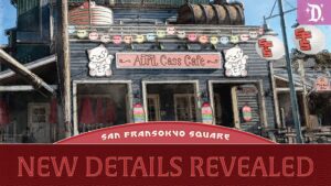 An exterior view of a whimsical café named "Aunt Cass Café," featuring colorful decorations and signage in a vibrant setting.