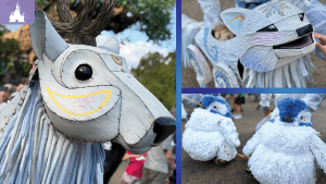 Whimsical animal puppets at Disney’s Animal Kingdom’s Merry Menagerie, featuring a reindeer, fox, and fluffy white-and-blue penguins.
