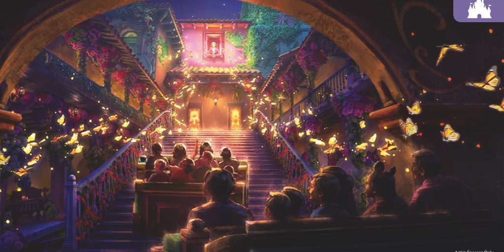 Visitors seated in ride vehicles pass under a stone arch into a flower-adorned courtyard with glowing butterflies and a grand staircase