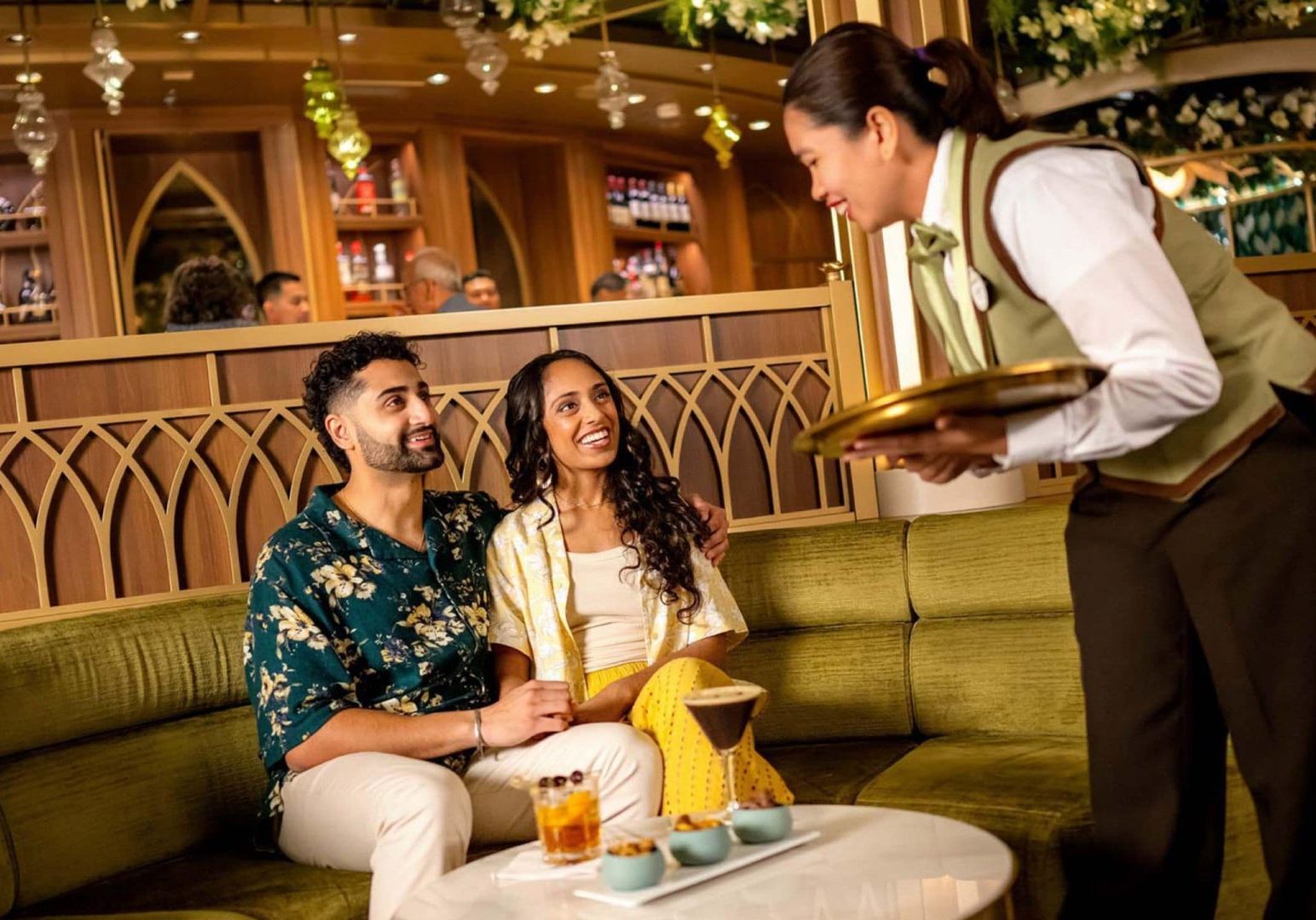 Tiana's Bayou Lounge on a Disney Cruise ship, with elegant New Orleans-inspired decor, cozy seating, and live jazz ambiance.