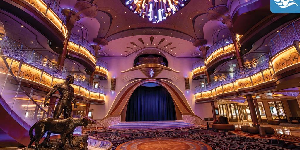 The Grand Hall aboard the Disney Destiny, featuring a statue of Black Panther and a panther, with elegant Wakandan-inspired design, glowing lights, and a vibrant chandelier.