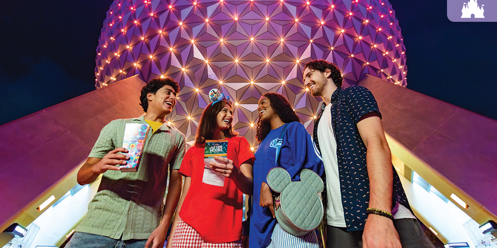 Four friends stand beneath a lit geodesic sphere, holding tickets and a snack box, smiling and talking at night.