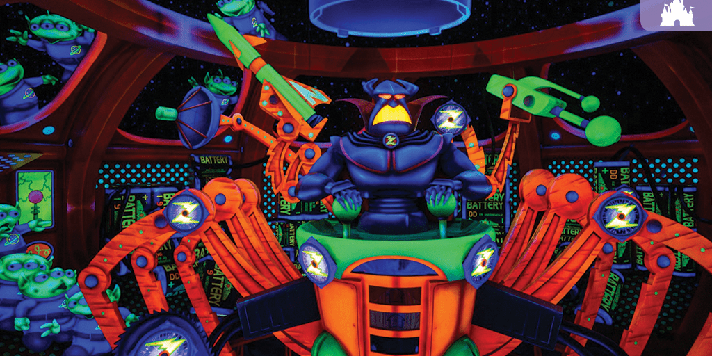 Emperor Zurg animatronic surrounded by glowing targets and green aliens inside Buzz Lightyear’s Space Ranger Spin ride scene at Magic Kingdom.