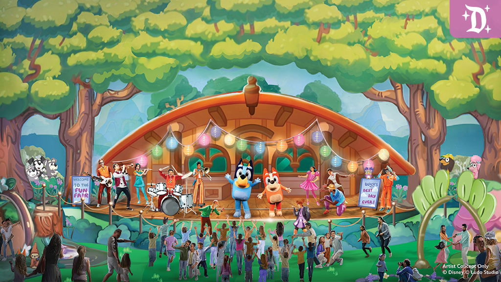 Bluey and Bingo perform on a colorful outdoor stage at Disneyland’s Fantasyland Theatre as kids dance and musicians play during “Bluey’s Best Day Ever!” show.