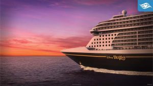 A Disney cruise ship sails on calm waters, set against a vibrant sunset sky with hues of pink and purple.