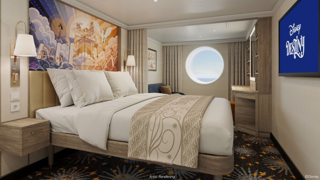 A cozy hotel room featuring a queen bed, colorful wall art, a large window, and a TV with the Disney logo.