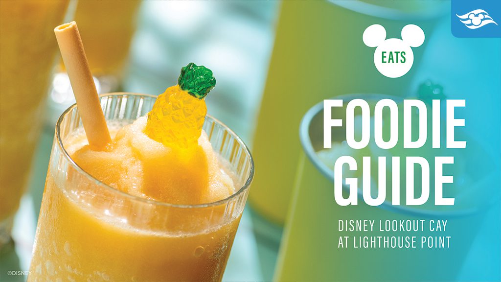 disney-cruise-line-lookout-cay-lighthouse-point-foodie-guide A vibrant drink garnished with a green leaf and orange slice, next to the text "Foodie Guide: Disney Lookout Cay at Lighthouse Point."