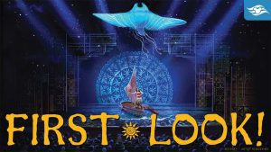 A vibrant stage scene features a glowing blue manta ray above a figure on a surfboard, with the text "FIRST LOOK!" prominently displayed.