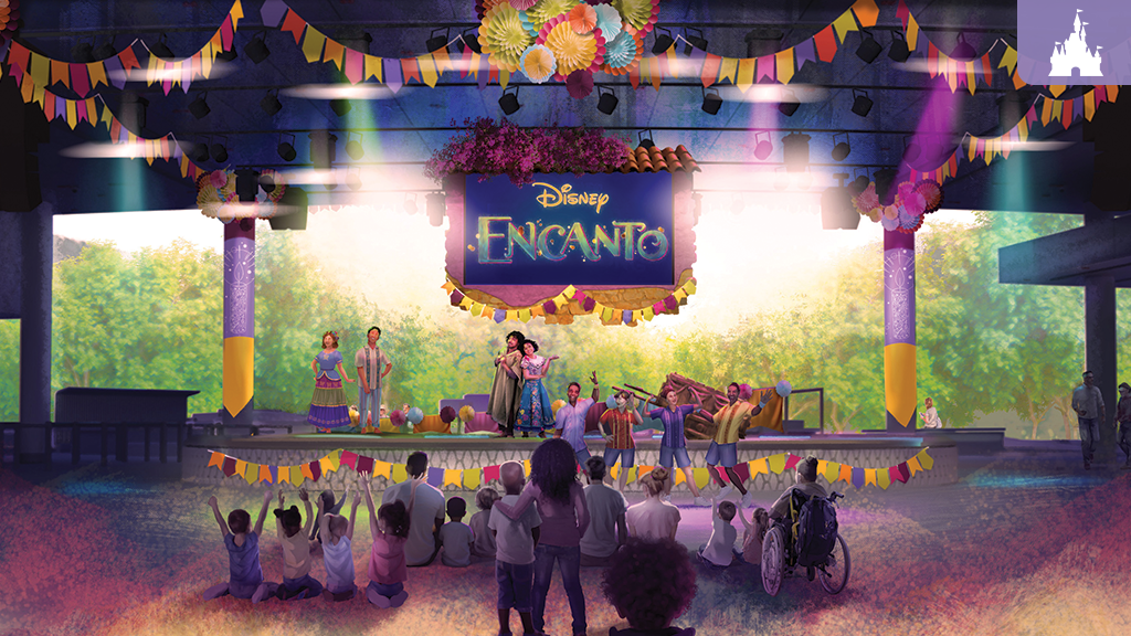 A vibrant stage is set for a performance of Disney's "Encanto," with colorful decorations and an audience captivated by the show.