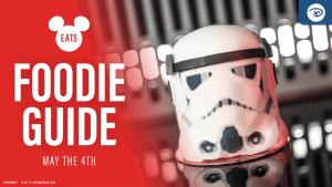A Stormtrooper-shaped dessert on a red background, promoting a "Foodie Guide" for May the 4th, with the Disney logo.