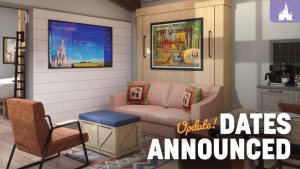 A cozy living room features a pink sofa, colorful artwork on the walls, and a large TV displaying an announcement about dates.