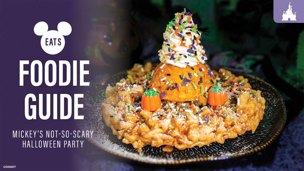 Halloween-themed funnel cake topped with whipped cream, sprinkles, and candy pumpkins at Mickey’s Not-So-Scary Halloween Party.
