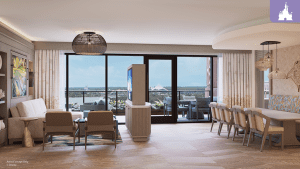 Modern living room with large windows showcasing a view, furnished with cozy seating, a dining table, and stylish decor elements.