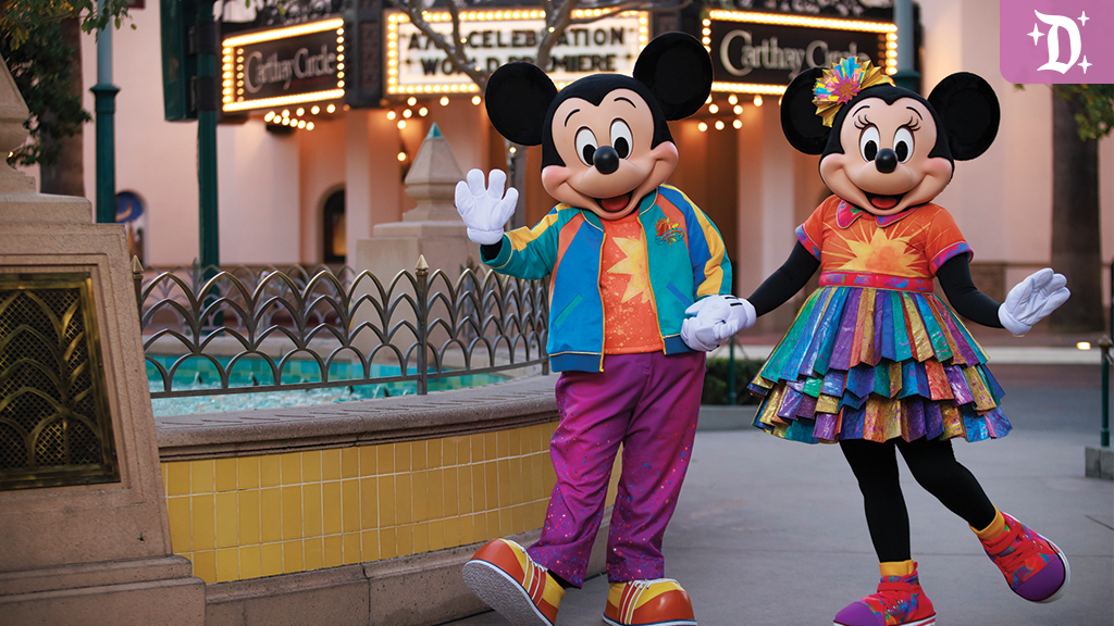 Mickey and Minnie Mouse wear colorful 25th anniversary outfits in front of Carthay Circle at Disney California Adventure.