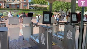 Disneyland’s new ADA-compliant entry gates featuring digital screens and scanners at the park’s main entrance.