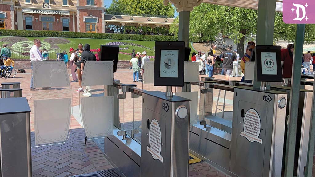 Disneyland’s new ADA-compliant entry gates featuring digital screens and scanners at the park’s main entrance.