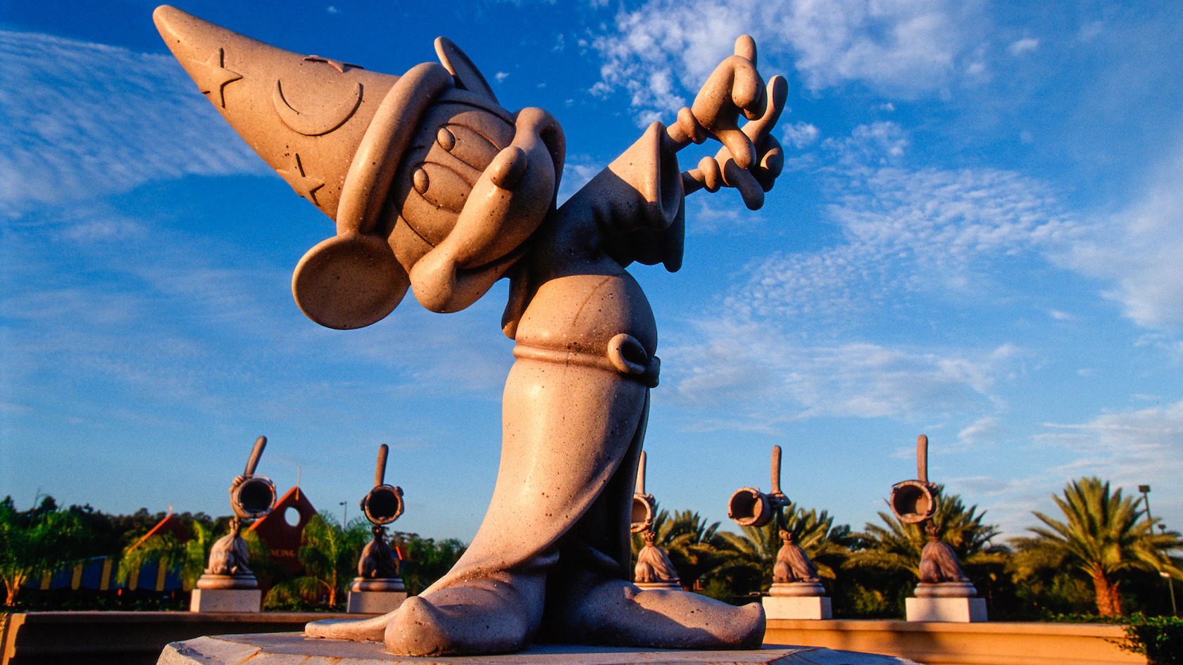 Miniature golf course at Fantasia Gardens with whimsical Disney-themed décor and lush landscaping.