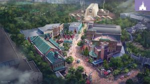 Aerial concept art of a new themed land at Disney’s Hollywood Studios, featuring detailed city-style architecture, lush greenery, and a central plaza with pathways leading to various attractions.