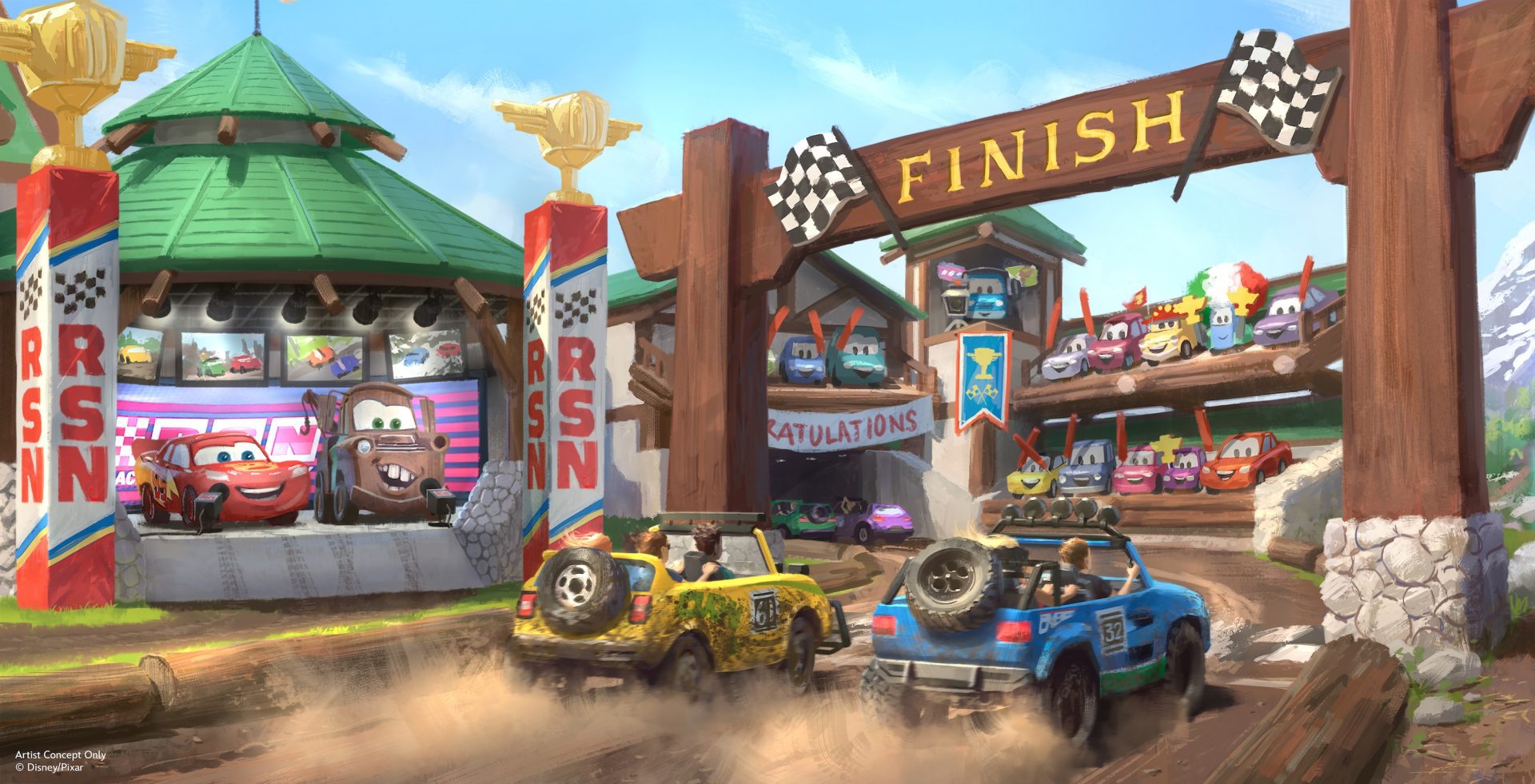 Two colorful race cars drive towards a "FINISH" line at a lively racetrack, surrounded by cheering spectators and themed decorations.