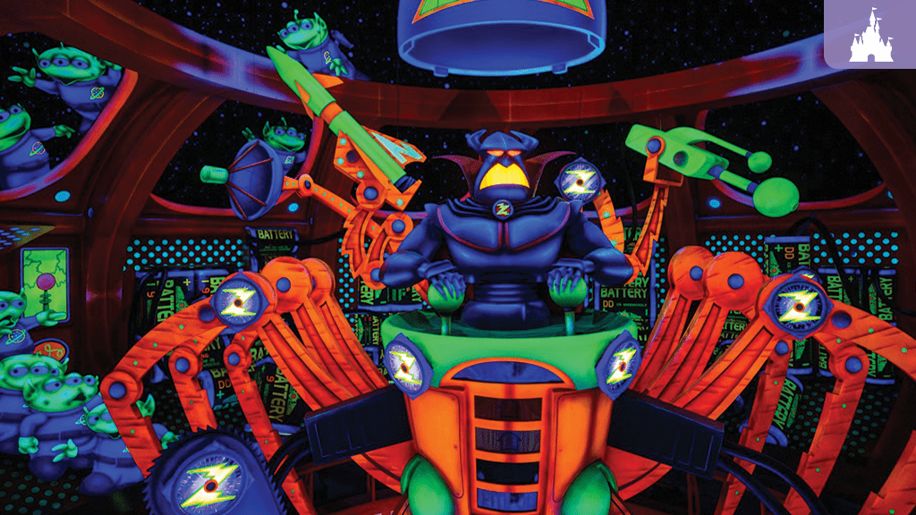Emperor Zurg animatronic surrounded by glowing targets and green aliens inside Buzz Lightyear’s Space Ranger Spin ride scene at Magic Kingdom.