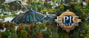 A detailed model of a theme park featuring lush greenery and a large dome structure, with the text "Universal Epic Universe" prominently displayed.