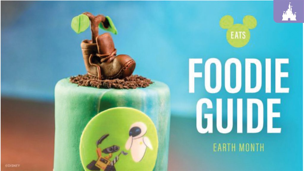 A cake with a green exterior, topped with a small plant and brown boots, next to text that reads "Foodie Guide" and "Earth Month."
